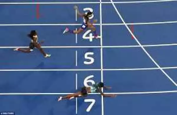 Bahamian Shaunae Miller wins gold by diving towards the end of the race